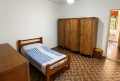 Casa 2 dormitorios con galpón — Barrio Matheu, Rosario — imagen 11